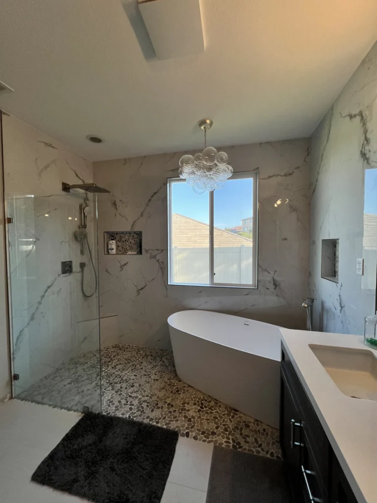 Primary bath with a freestanding tub, walk-in shower and pebble floor, Corona Hills