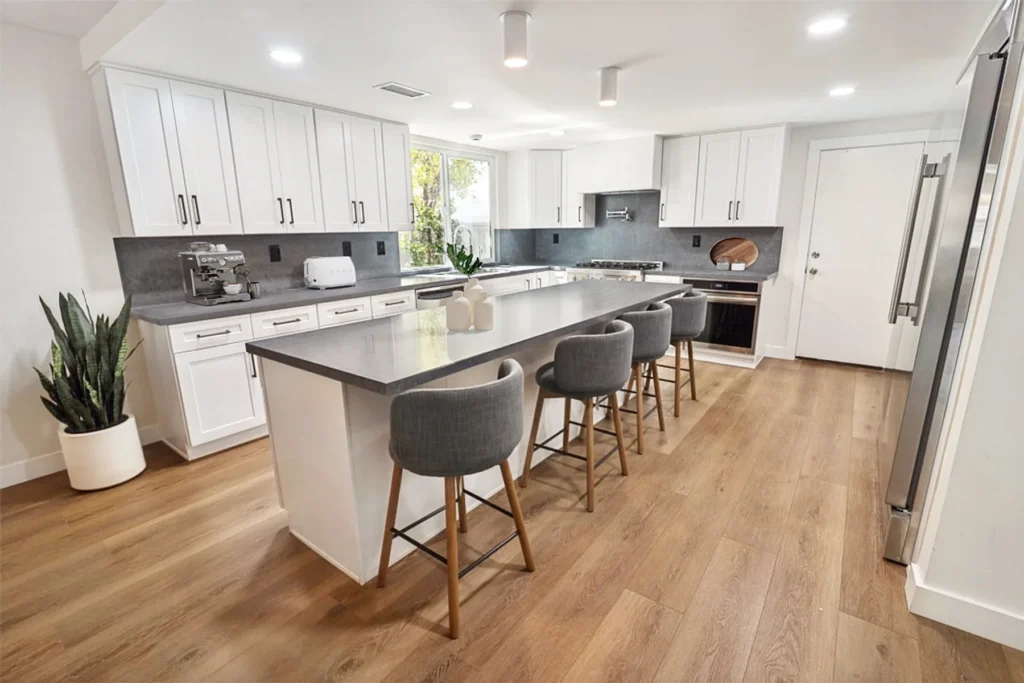 Kitchen island with seating, La Jolla remodel by CASA Renovations