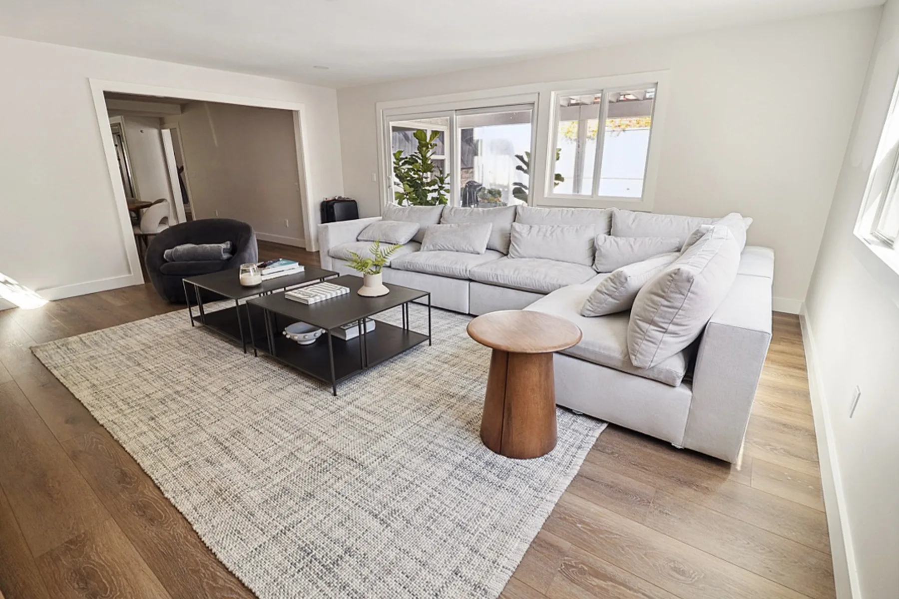 Living room with sectional and armchairs, La Jolla remodel