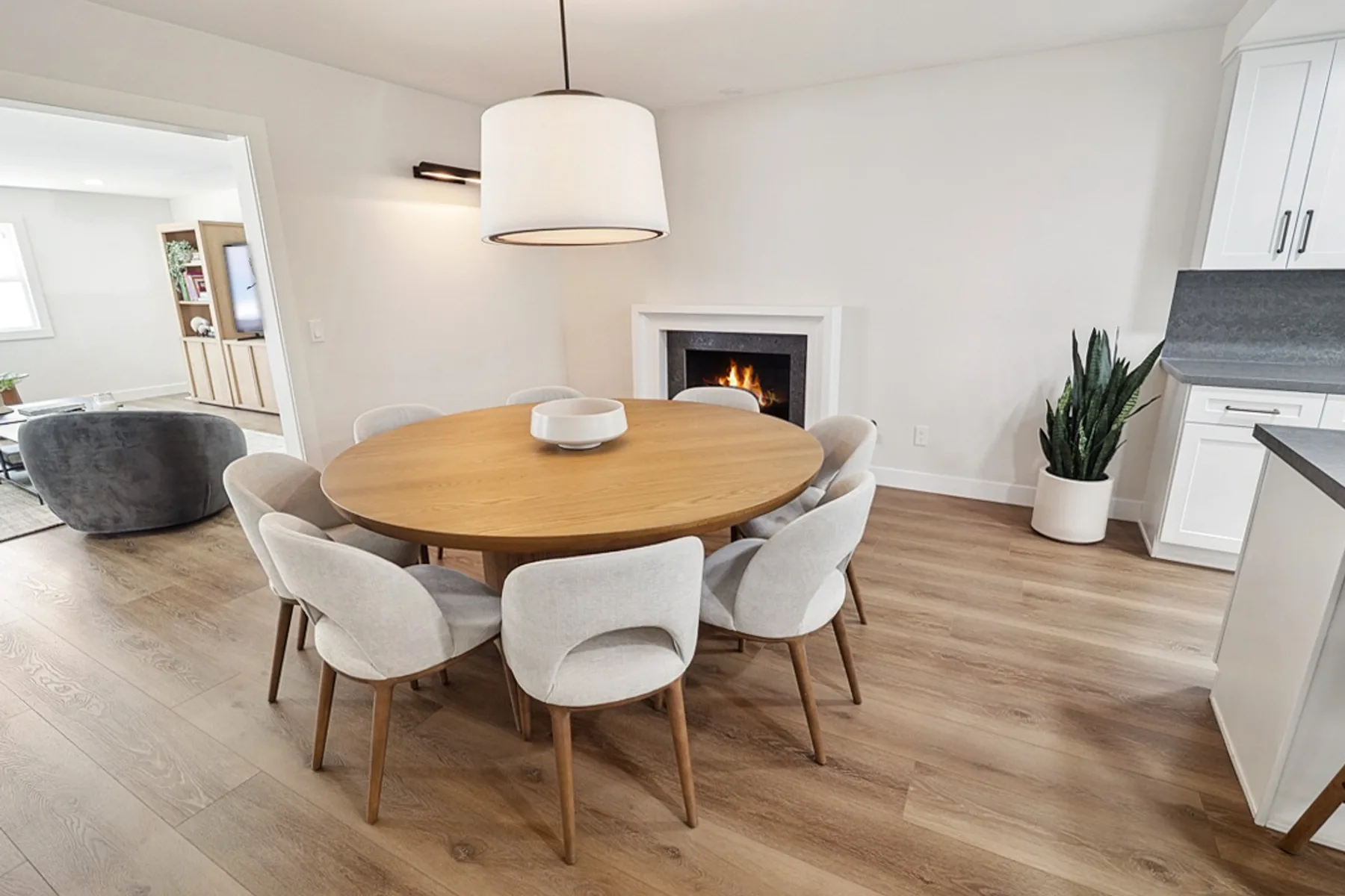 Dining table by the fireplace, La Jolla remodel