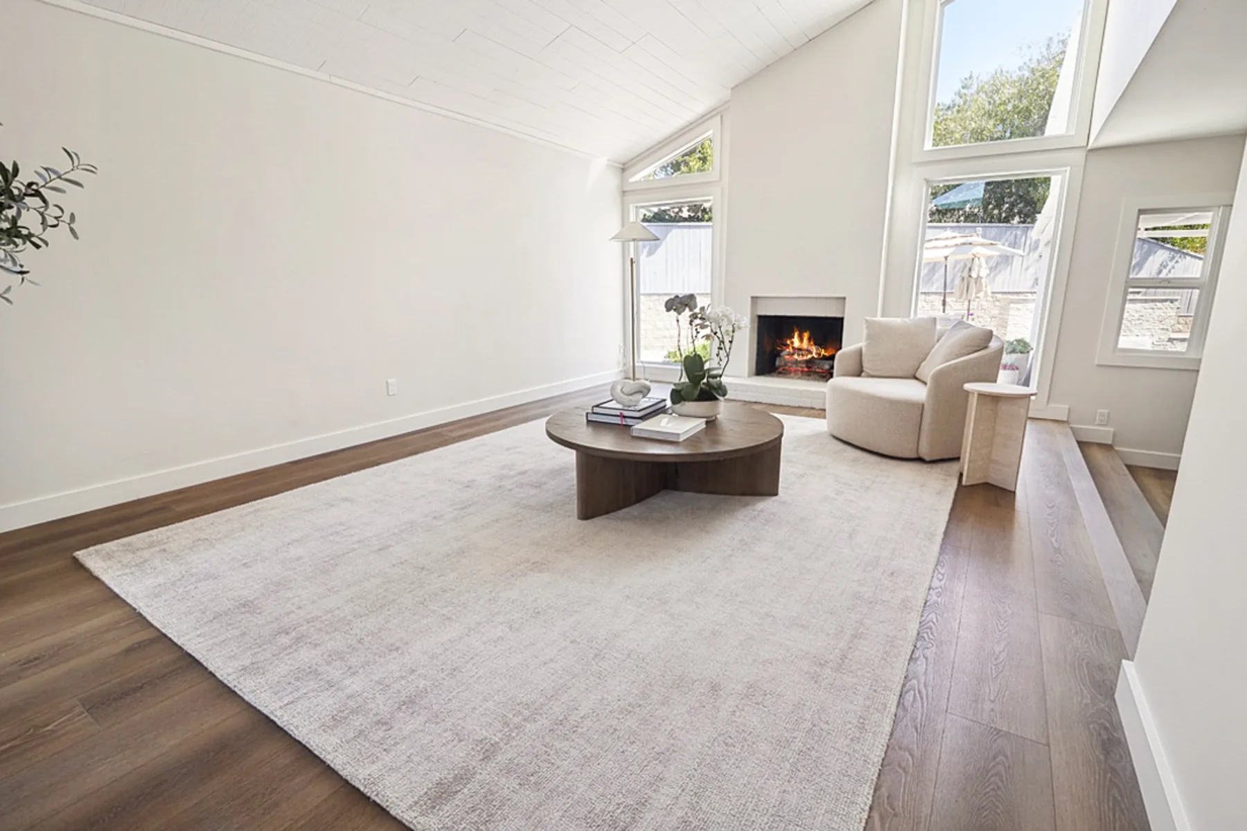 Living room fireplace and vaulted ceiling, La Jolla remodel
